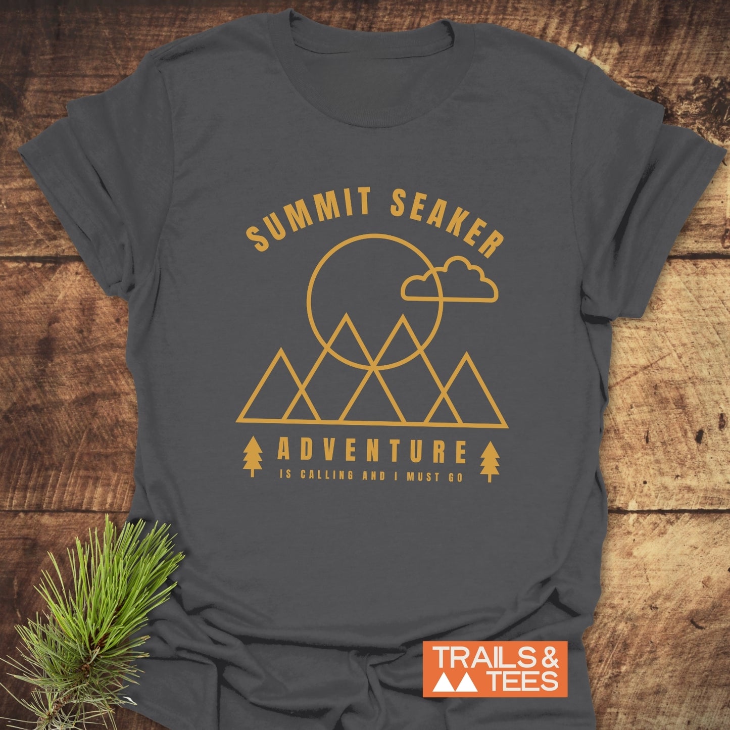 Summit Seeker T-Shirt with a golden-yellow mountain graphic, crafted from soft cotton for comfort and durability, ideal for outdoor enthusiasts.