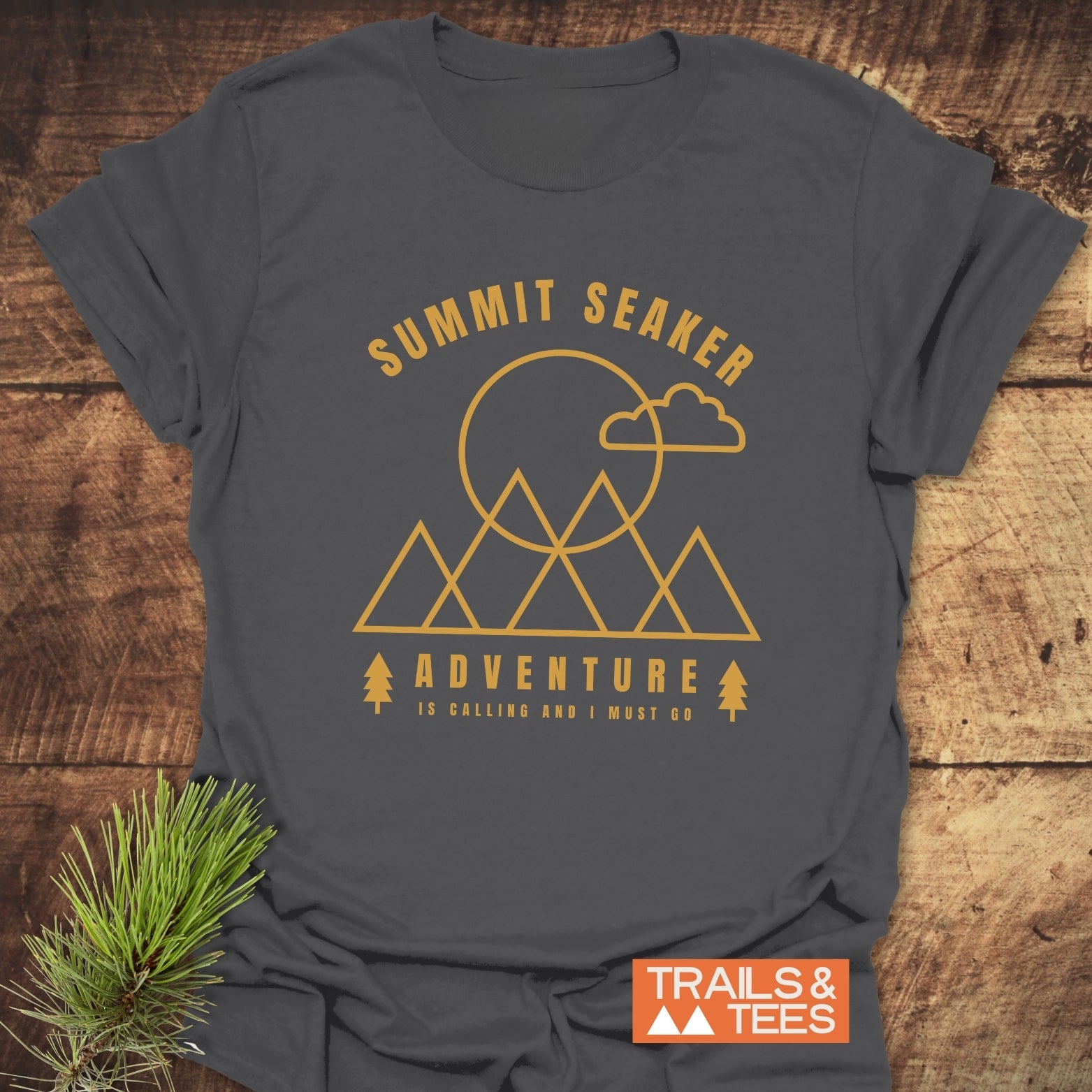 Summit Seeker T-Shirt with a golden-yellow mountain graphic, crafted from soft cotton for comfort and durability, ideal for outdoor enthusiasts.