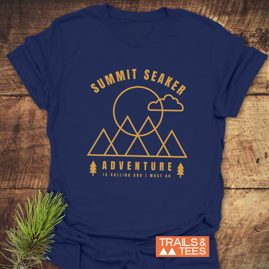 Summit Seeker T-Shirt featuring mountain graphic and “Adventure is calling” slogan, crafted from soft cotton for comfort and durability on any outdoor journey.