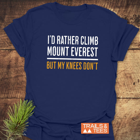 Navy T-shirt with I'D RATHER CLIMB MOUNT EVEREST text in white and orange. TRAILS & TEES logo displayed.