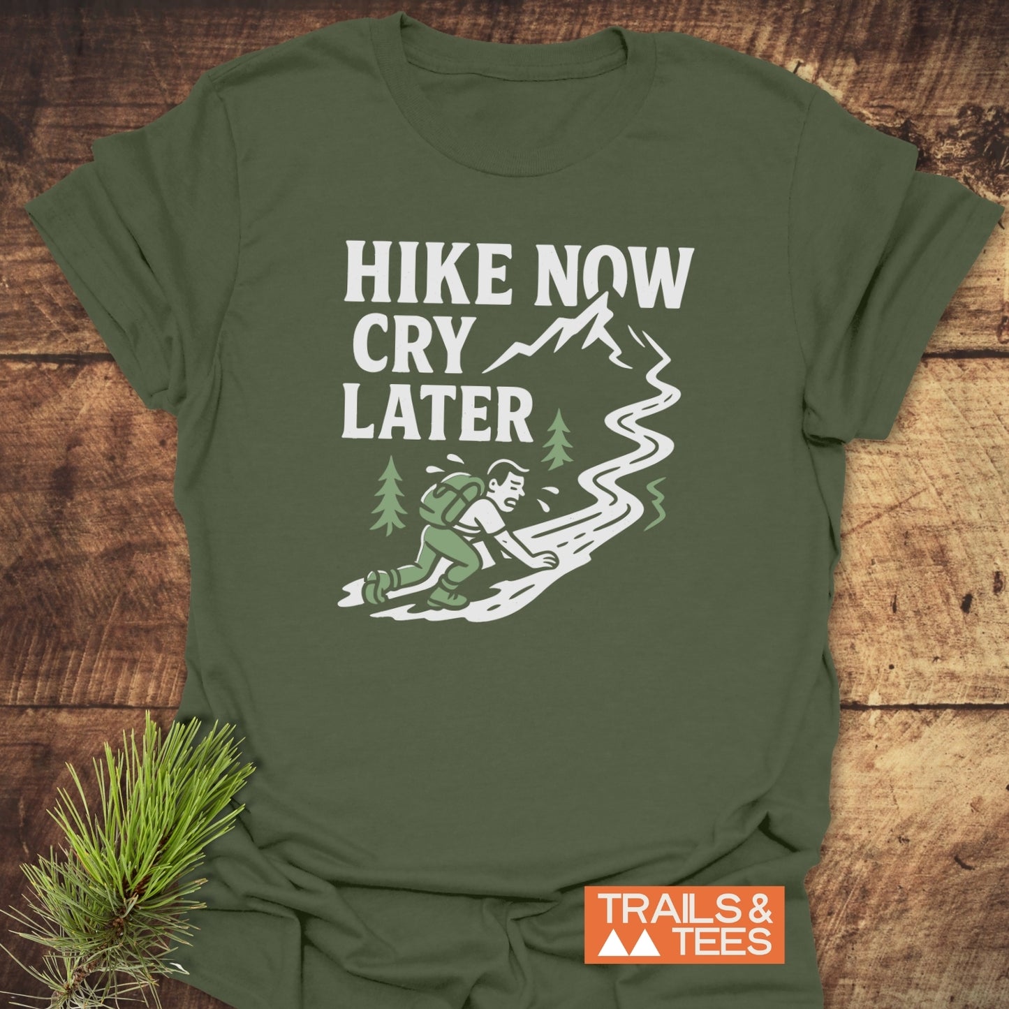 Cry Later Funny T-Shirt featuring “HIKE NOW CRY LATER” slogan and hiker illustration, crafted from soft cotton for comfort and durability, ideal for outdoor enthusiasts.