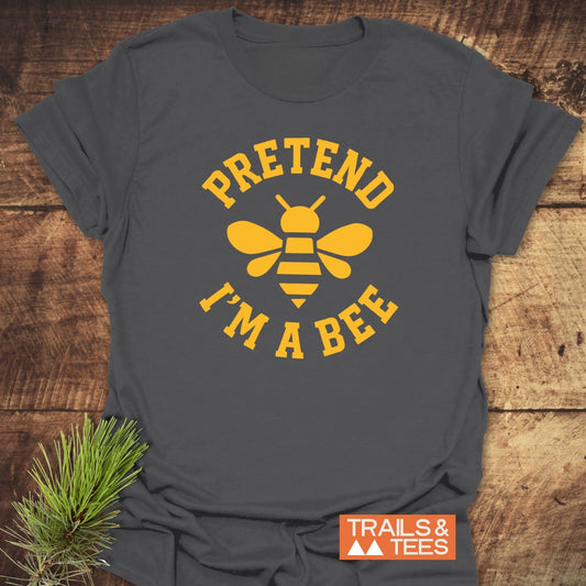 I'm A Bee Funny T-Shirt: Dark gray tee with yellow bee print, 'PRETEND I'M A BEE' text, crafted from soft cotton for everyday adventure.