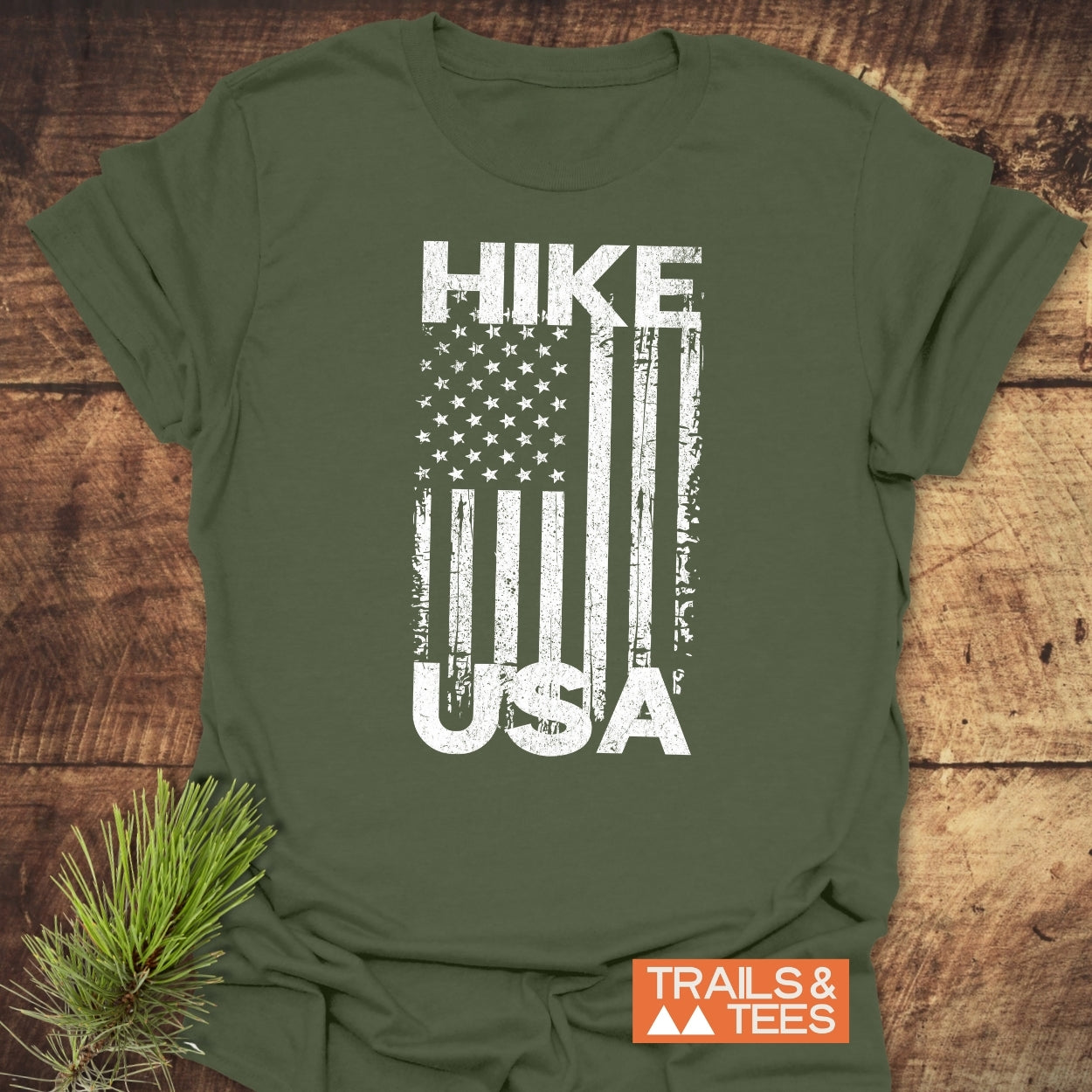 Hike USA T-Shirt with distressed flag motif, soft ring-spun cotton, durable print, designed for outdoor enthusiasts, featuring HIKE and USA text.