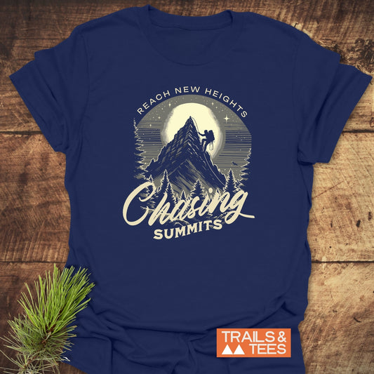 Chasing Summits T-Shirt: Features a mountain-climbing graphic with climber, full moon, and REACH NEW HEIGHTS text. Includes TRAILS & TEES logo.