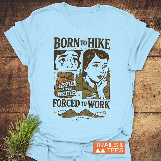 Light-blue Forced To Work Funny T-Shirt with retro hiking graphic, soft cotton, pre-shrunk, durable print, taped shoulders, no side seams.