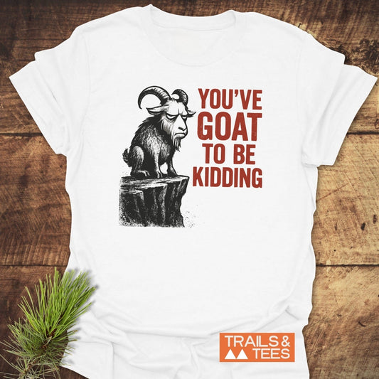 Kidding Goat Funny T-Shirt with a grumpy goat illustration and red text. Crafted from soft, ring-spun cotton for comfort, featuring durable, non-fading print.