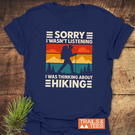 Thinking About Hiking T-Shirt featuring a retro graphic of a backpacker silhouette, crafted from soft cotton, perfect for outdoor enthusiasts.
