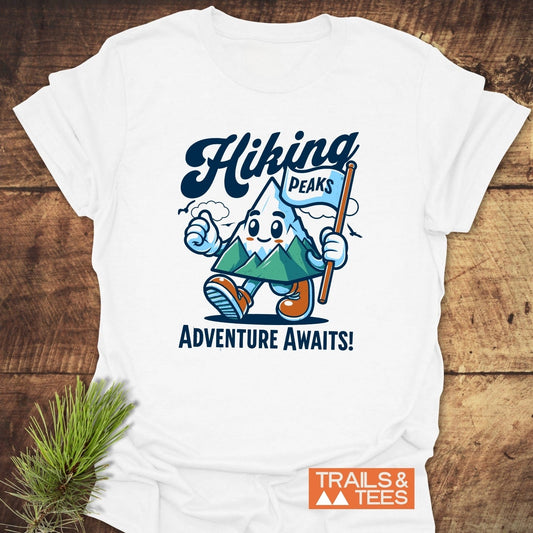 Hiking Time Funny T-Shirt features a mountain cartoon with Hiking Adventure Awaits! slogan, emphasizing outdoor spirit on soft, durable cotton for everyday comfort.