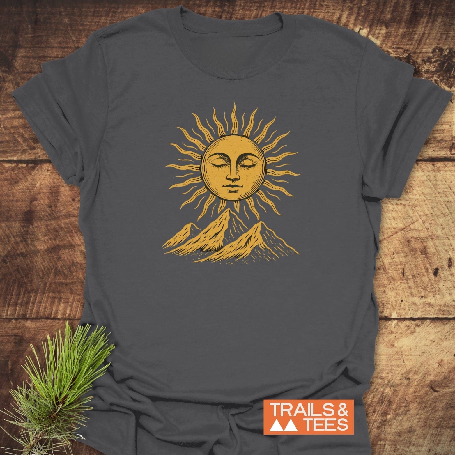 Sun And Mountains Boho T-Shirt featuring a golden sun and mountain design, crafted from soft, lightweight cotton for comfort and adventure-ready wear.