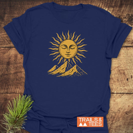 Sun And Mountains Boho T-Shirt with a stylized sun graphic above mountains, showcasing outdoor adventure spirit. Comfortable, durable, and pre-shrunk for reliable fit.