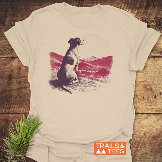 Mountains and Dog T-Shirt featuring a dog illustration on a hilltop, crafted from lightweight cotton. Pre-shrunk, durable prints, designed for outdoor enthusiasts.