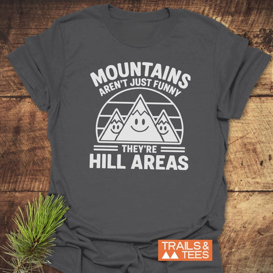 Copy of I love Mountains And Coffee T-Shirt featuring cartoon mountains graphic and pun slogan, showcasing durable comfort and timeless outdoor design by Trails & Tees.