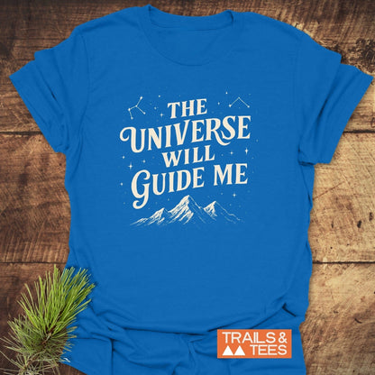The Universe Guides Me T-Shirt: Bright blue tee with mountain and star graphics, crafted from soft cotton for comfort, featuring durable prints and a reliable fit, by Trails & Tees.