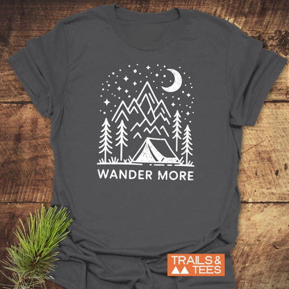 Wander More T-Shirt with mountain camping scene, crafted from soft cotton for comfort. Features pre-shrunk fit, durable print, and eco-friendly design.
