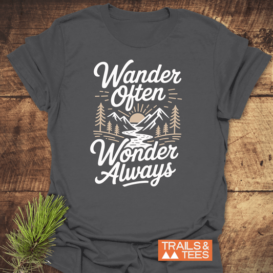 Wander Often T-Shirt with mountain graphic on dark-gray fabric, emphasizing outdoor adventure.