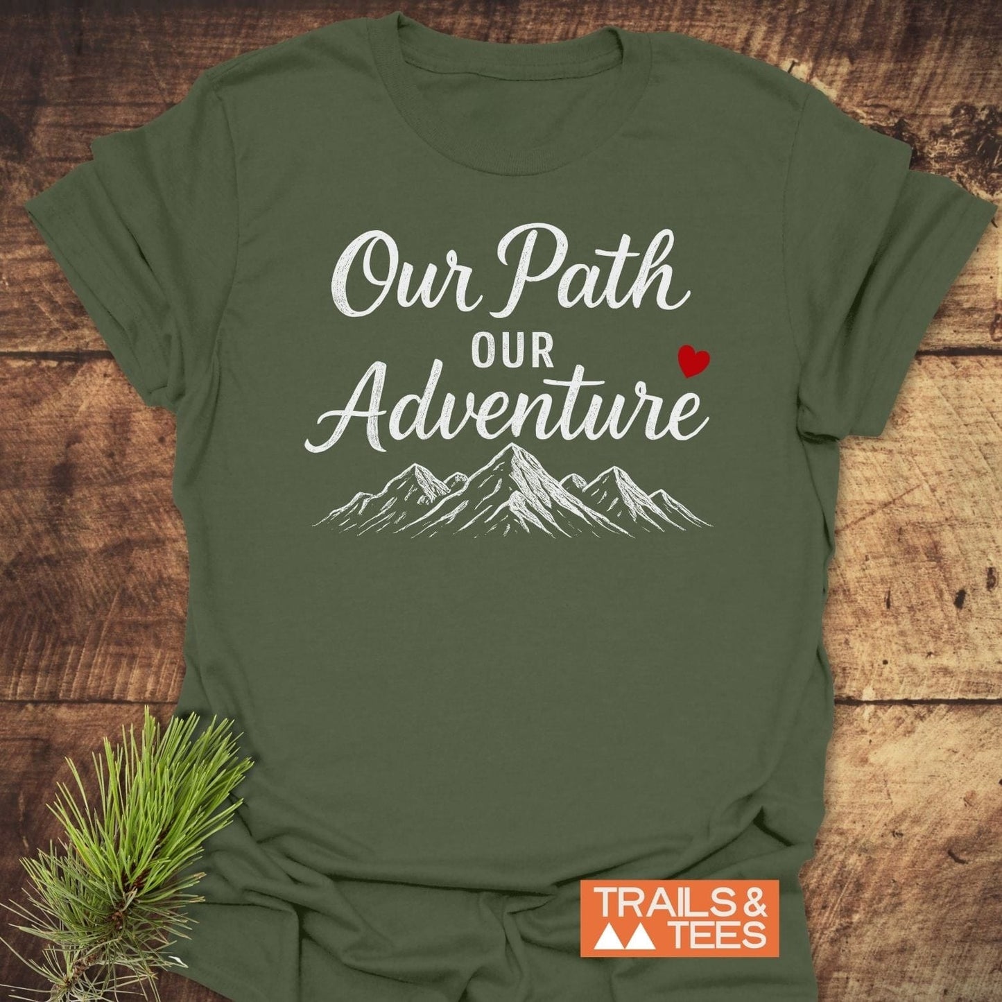 Our Path Couple T-Shirt features white text and mountain graphic, red heart accent, crafted from soft cotton for comfort, enhancing outdoor adventures with style.