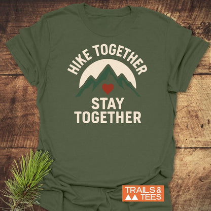 Hike Together Couple T-Shirt featuring a mountain and sun design, crafted from soft ring-spun cotton, ideal for outdoor lovers. Label reads TRAILS & TEES.
