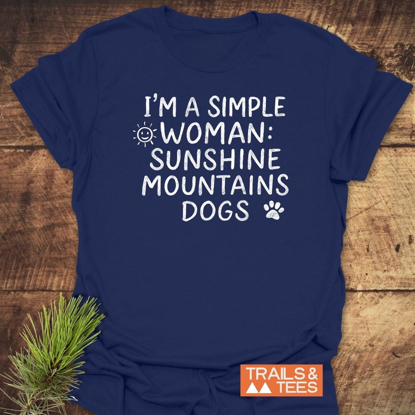 Sunshine Mountains Dogs T-Shirt laid flat, showcasing hand-lettered text and icons, ideal for outdoor enthusiasts, crafted from soft, durable, ring-spun cotton.