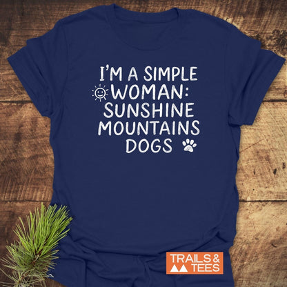 Sunshine Mountains Dogs T-Shirt laid flat, showcasing hand-lettered text and icons, ideal for outdoor enthusiasts, crafted from soft, durable, ring-spun cotton.