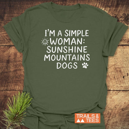 Sunshine Mountains Dogs T-Shirt in forest-green with white slogan and sun, paw print icons; soft cotton, pre-shrunk, durable print, Trails & Tees logo.