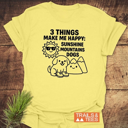 Sunshine Mountains Dogs T-Shirt with a graphic of sun, mountains, and dog. Soft, lightweight cotton, trail-tested comfort, durable prints.