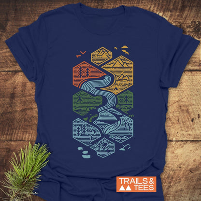 Everything Flows T-Shirt featuring a geometric nature graphic with a river motif, crafted from soft cotton for comfort and adventure, showcasing outdoor-inspired design.