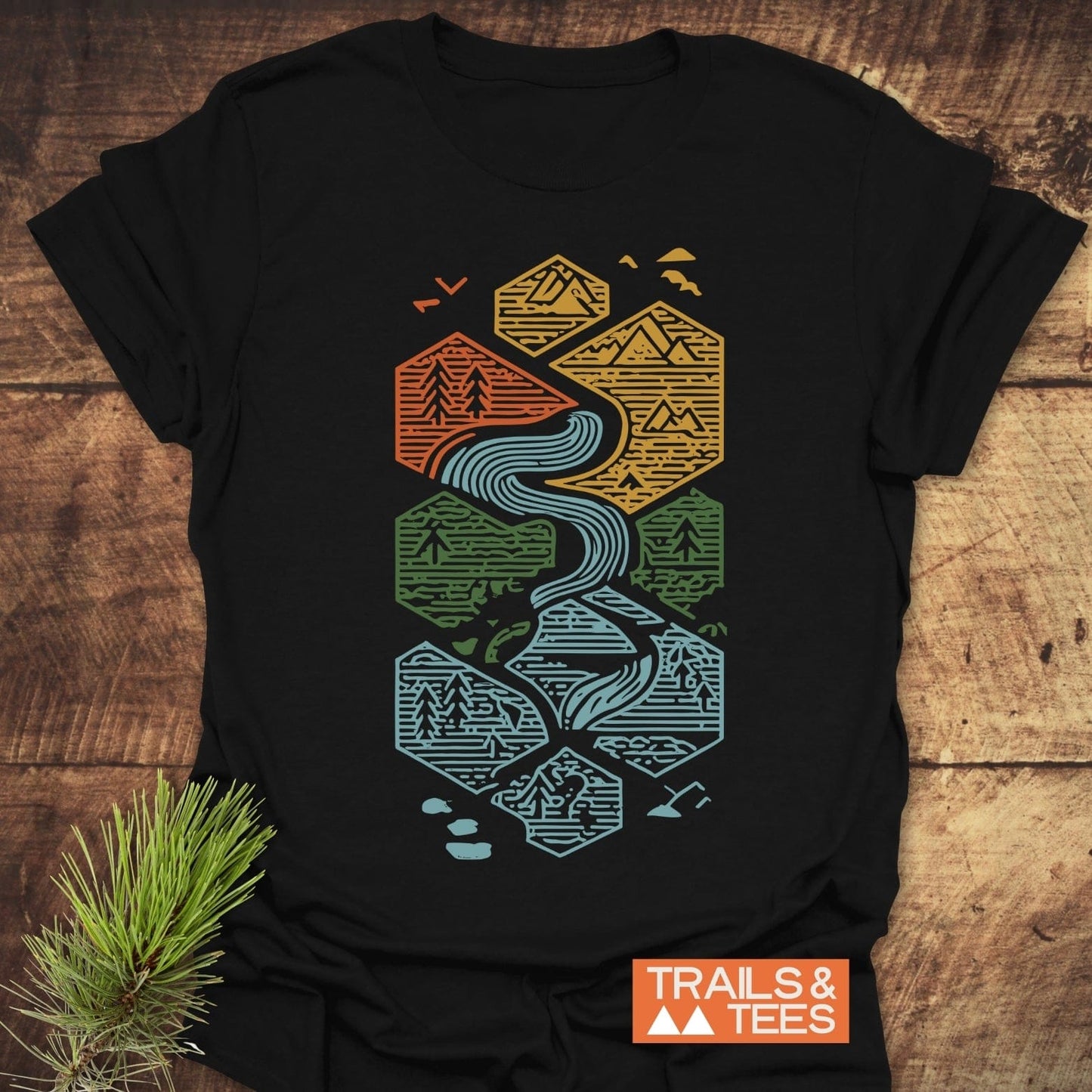 Everything Flows T-Shirt with stacked hexagons featuring outdoor scenes and a river graphic, showcasing durable prints on soft, ring-spun cotton for adventure lovers.