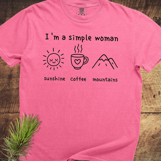 I'm A Simple Woman Comfort Colors 1717 Tee with sun, coffee, mountains icons on front, showcasing durable, soft-washed fabric and relaxed fit.