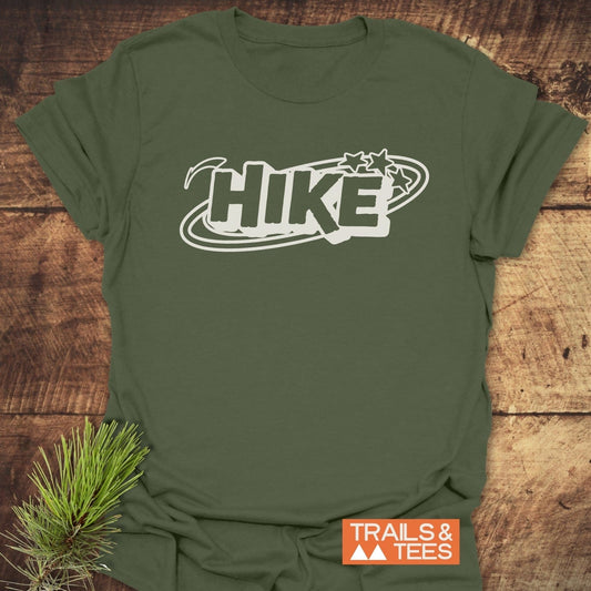 Hike Graphic T-Shirt with bold HIKE print and stars on soft, ring-spun cotton. Pine sprig accentuates the adventure theme. Durable, pre-shrunk for lasting fit.