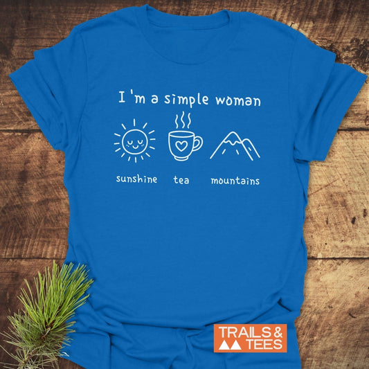 I'm A Simple Woman - Sunshine Tea Mountains T-Shirt featuring white icons of a sun, mug, and mountains, with TRAILS & TEES logo.