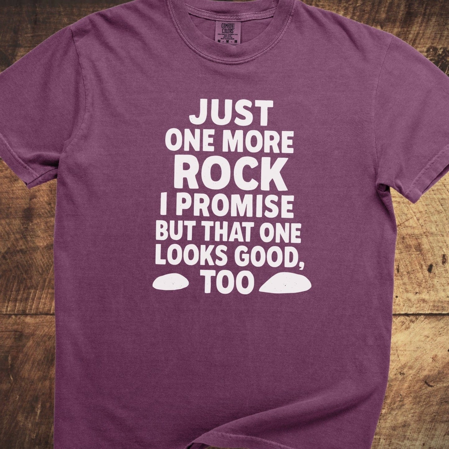 Just One More Rock Funny Comfort Colors 1717 Tee featuring a white slogan and rock silhouettes on a purple T-shirt, showcasing a relaxed fit and durable stitching.