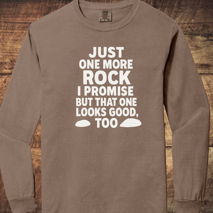 Just One More Rock Comfort Colors Long-Sleeve Tee in brown, featuring bold white text and rock silhouettes, made of 100% ring-spun cotton, laid flat.