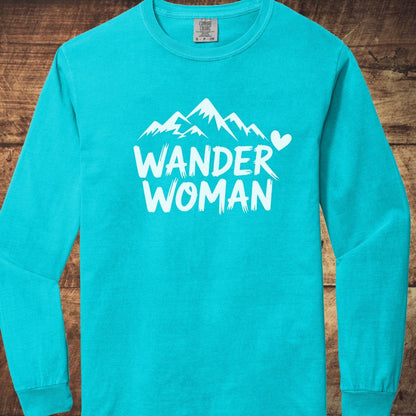 Wander Woman Comfort Colors Long-Sleeve Tee featuring stylized mountain peaks and heart graphic, crafted from soft 100% ring-spun cotton for a relaxed, classic fit.