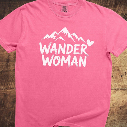 Wander Woman Comfort Colors 1717 Tee with white mountain graphic and playful text, offering relaxed fit and durable, soft-washed 100% ring-spun cotton.