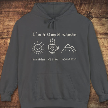 I'm A Simple Woman Comfort Colors Hoodie with sun, coffee, and mountain icons on the front, ideal for cozy or outdoor adventures, featuring a relaxed unisex fit.