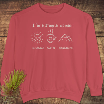 I'm A Simple Woman Comfort Colors 1566 Sweatshirt with sun, coffee, and mountain icons on a red crewneck, showcasing relaxed fit and luxurious fabric.
