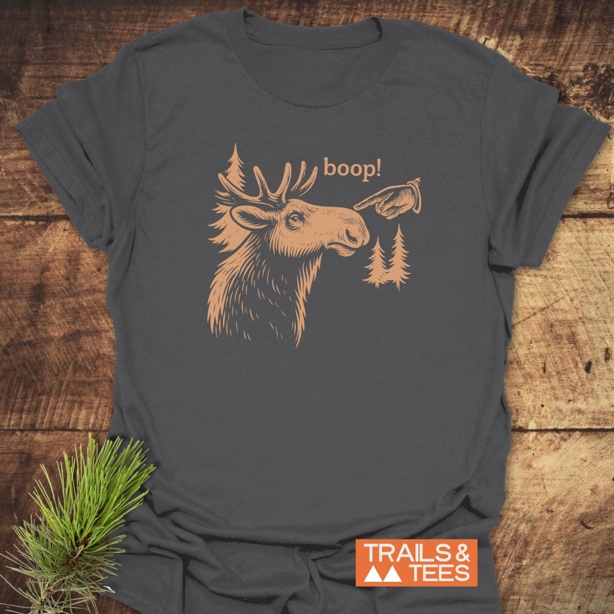 BOOP Moose Funny T-Shirt with a moose illustration and boop! text, showcasing rustic charm on soft ring-spun cotton for outdoor enthusiasts.