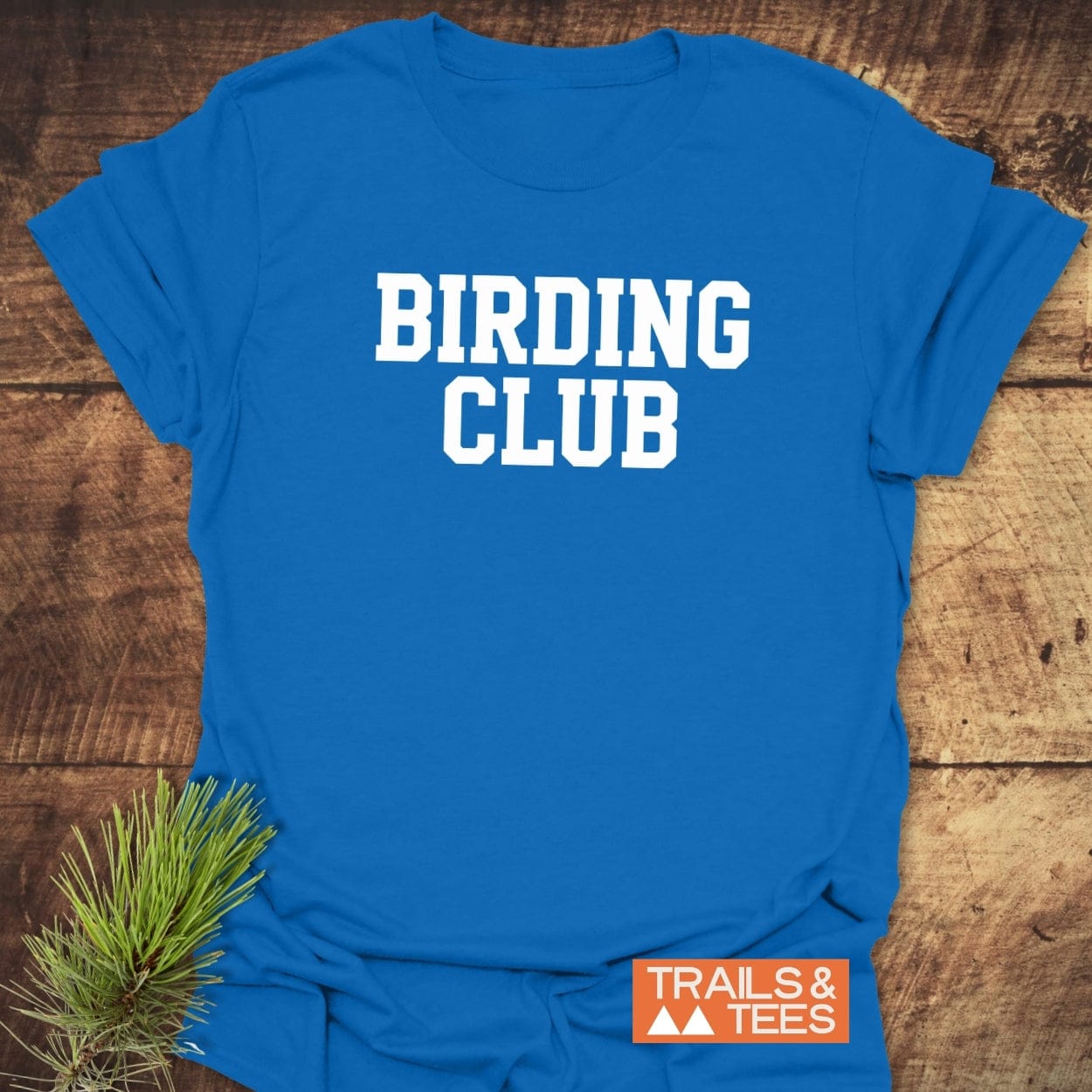 Birding Club T-Shirt with BIRDING CLUB text in collegiate-style and TRAILS & TEES logo, featuring taped shoulders and durable prints for outdoor enthusiasts.