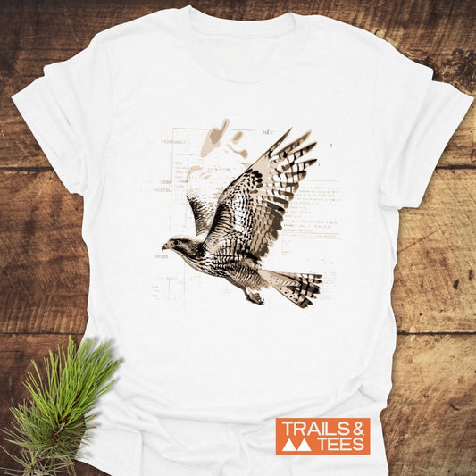 Bird Nerd T-Shirt featuring a sepia-toned hawk print on soft, lightweight cotton. Includes TRAILS & TEES logo, pre-shrunk fit, durable design.