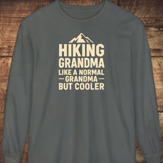 Hiking Grandma Comfort Colors Long-Sleeve Tee featuring a cream graphic of mountains and text, crafted from soft, 100% ring-spun cotton for relaxed comfort.