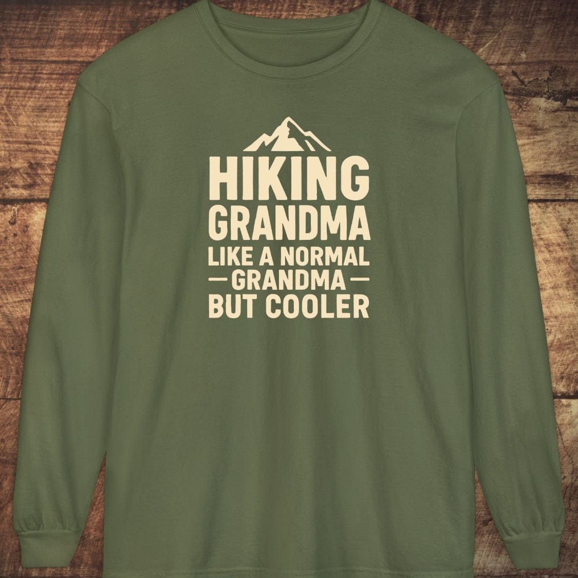 Olive-green Hiking Grandma Comfort Colors long-sleeve tee with mountain icon, made from 100% cotton for a soft, relaxed fit.