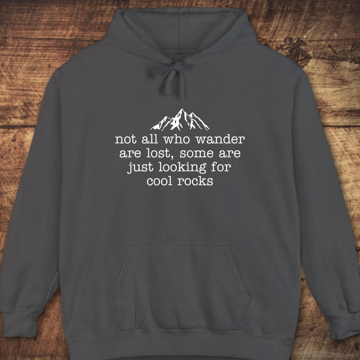 Looking For Cool Rocks Comfort Colors Hoodie with mountain graphic, text, drawstring hood, and kangaroo pocket, perfect for layering and adventure.