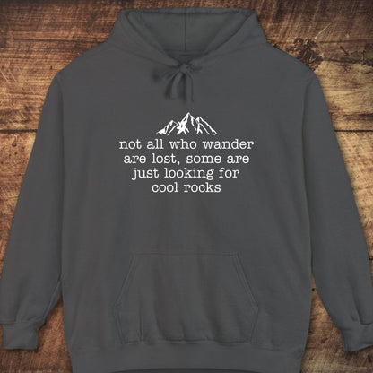 Looking For Cool Rocks Comfort Colors Hoodie with mountain graphic, text, drawstring hood, and kangaroo pocket, perfect for layering and adventure.