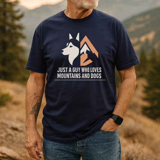 Man outdoors wearing Mountain And Dog Love T-Shirt, showcasing a husky profile and mountain graphic, paired with jeans and a smartwatch.