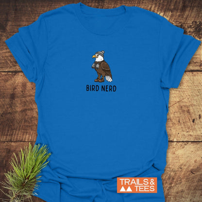 Bird Nerd Funny T-Shirt featuring a cartoon eagle in hiking gear, BIRD NERD text, on soft cotton for comfort and durability.
