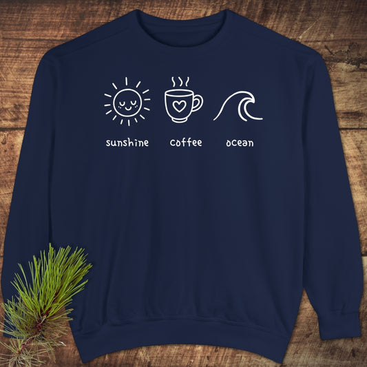 I'm A Simple Woman - Sunshine Coffee Ocean Sweatshirt features charming white line-drawings of a sun, coffee mug, and wave, offering a relaxed fit for luxurious comfort in everyday style.