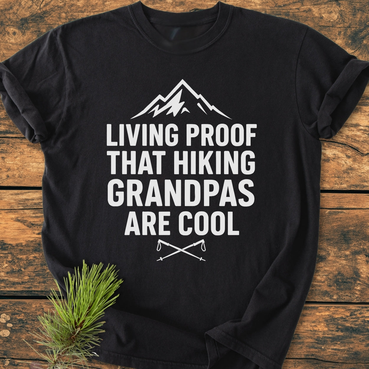 Living Proof Grandpa - Vintage Wash Tee features a black shirt with a mountain graphic and cool hiking grandpas text. Enhanced with a soft, durable finish and relaxed fit, perfect for everyday wear.