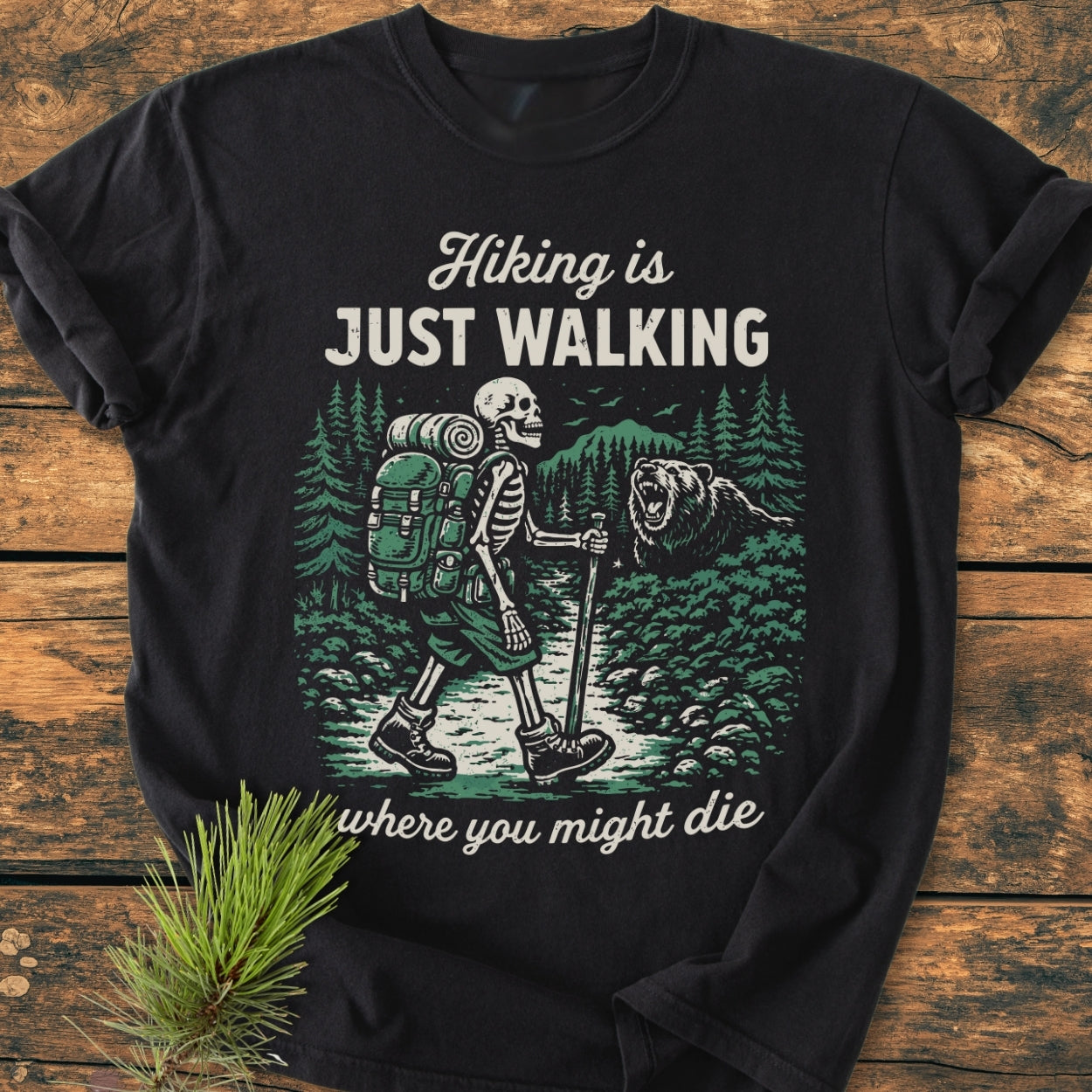 Hiking Is Just Walking - Vintage Wash Tee features a retro walking skeleton on a forest trail with a bear. Made of soft, pre-shrunk 100% ring-spun cotton, offering comfort and durability.