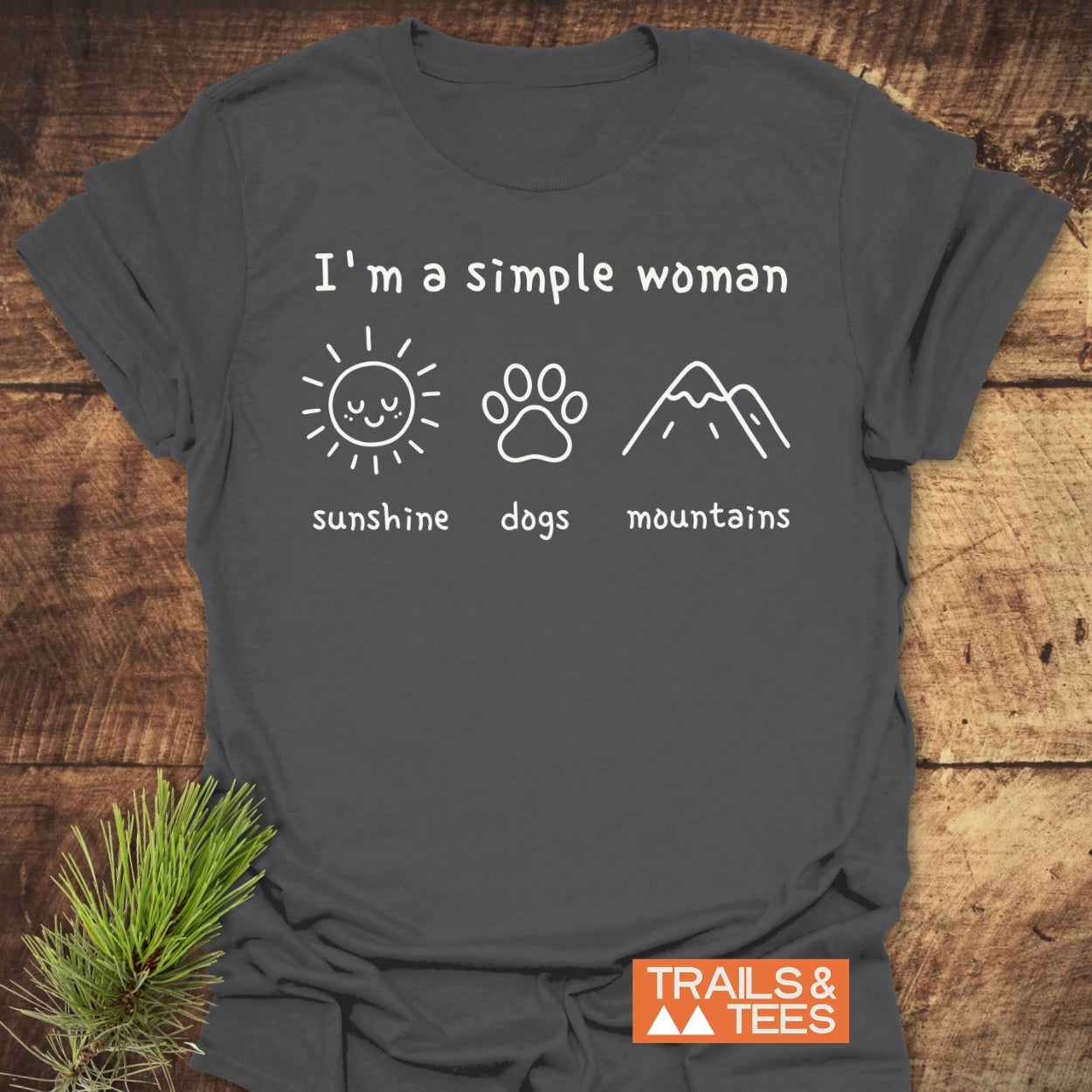 I'm A Simple Woman - Sunshine, Dogs, Mountains T-Shirt featuring white print icons on a dark gray tee. Designed for comfort with ring-spun cotton, highlighting outdoor love through sun, dog, and mountain motifs.