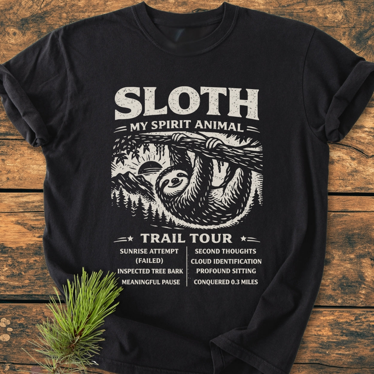 Sloth Spirit Animal Tour - Vintage Wash Tee features a playful sloth design with humorous trail activities list, printed on a relaxed fit, soft-washed black T-shirt, ideal for casual comfort.
